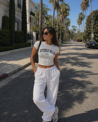 Women's Beverly Hills Baby Tee – Beverly Hills, California serif print by The Cali Store
